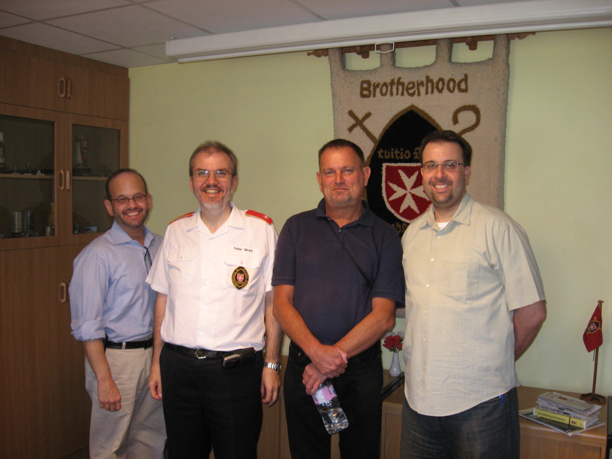 Johan Viljoen, third from the left and holding a water bottle, during the HAART programme site visit on 7 February 2009
