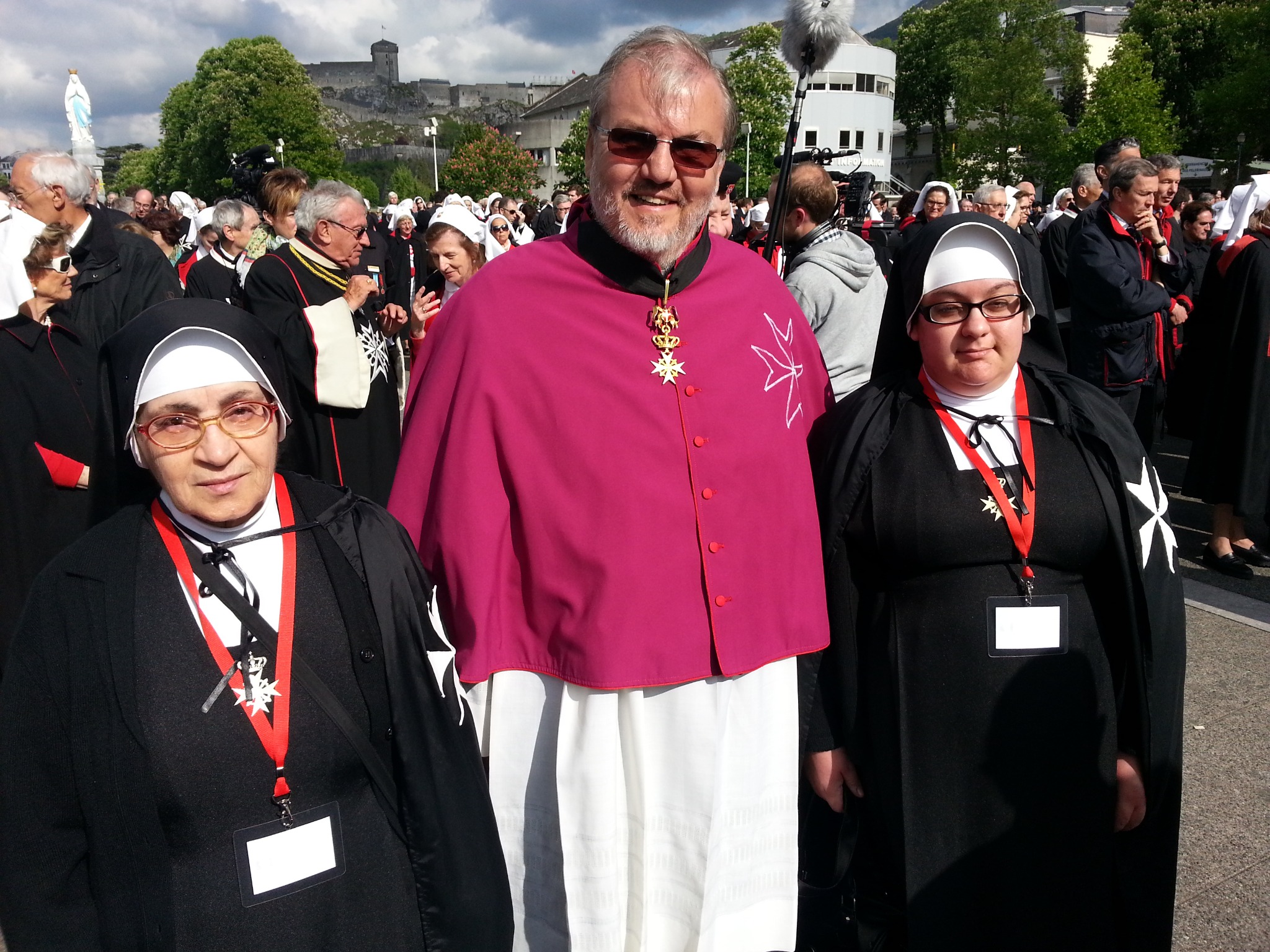 Father Gérard T. Lagleder O.S.B. wearing the insignia of a Conventual Chaplain ad honorem at Lourdes in 2014