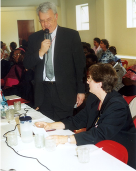 Frà Ludwig Hoffmann von Rumerstein speaking with guests during the community celebration