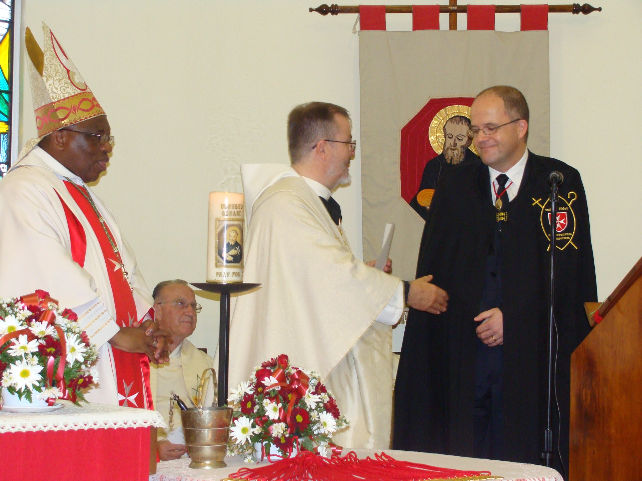 Dr Andreas Heinze being congratulated during his admission on 10 October 2010