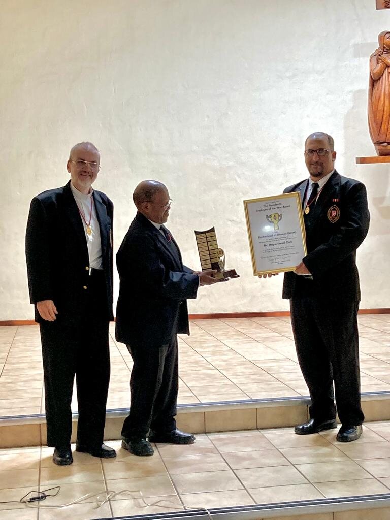 Hayne Gerald Clark receiving the President’s Employee of the Year Award for 2020