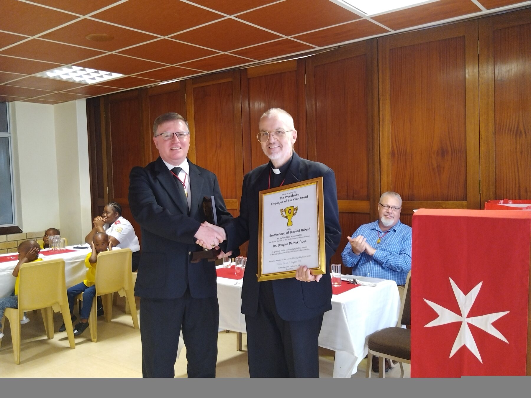 Dr Douglas Patrick Ross receiving the President’s Employee of the Year Award for 2023