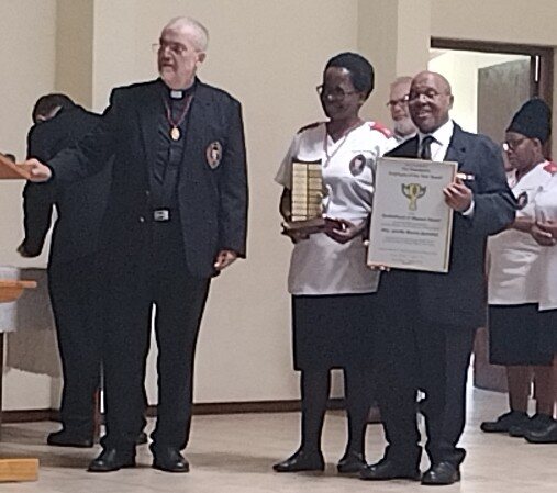 Jabulile Monica Buthelezi receiving the President’s Employee of the Year Award for 2024