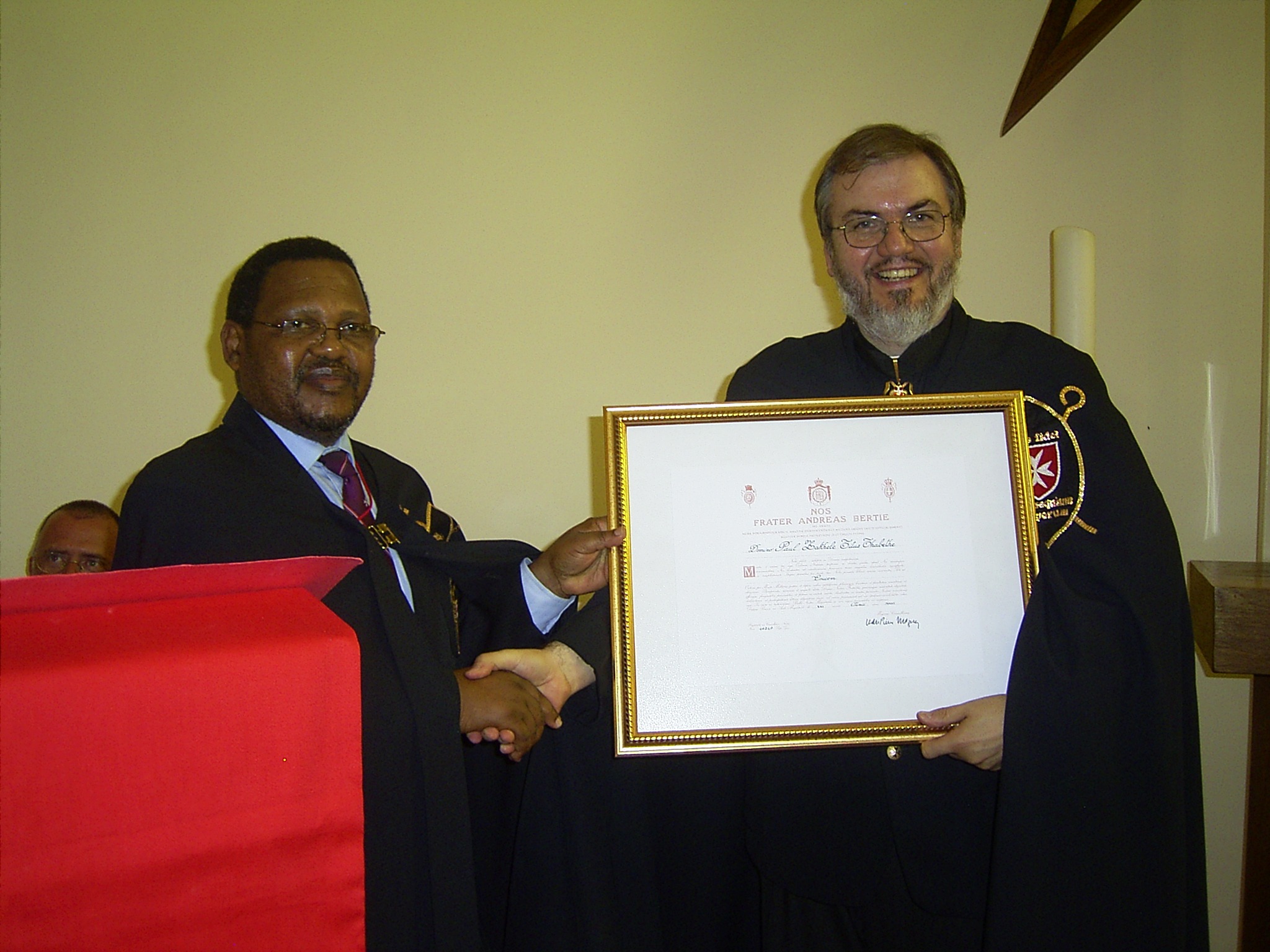 Dr Paul Thabethe receiving the Cross pro Merito Melitensi
