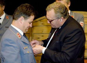 Maximilian Rauecker receiving the Cross pro Merito Melitensi on 14 September 2009