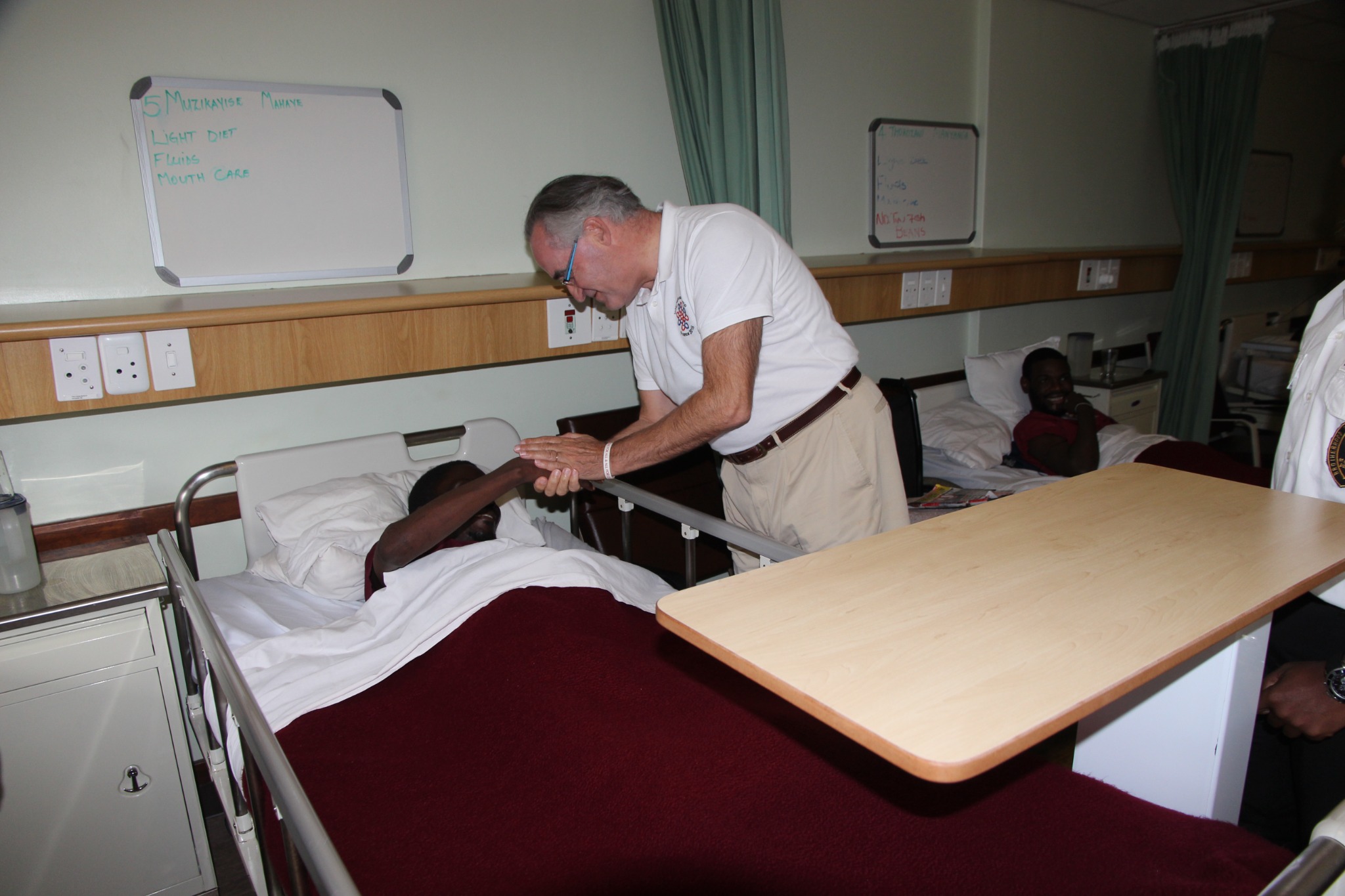 Dominique Prince de La Rochefoucauld-Montbel greeting a patient in Blessed Gérard's Hospice